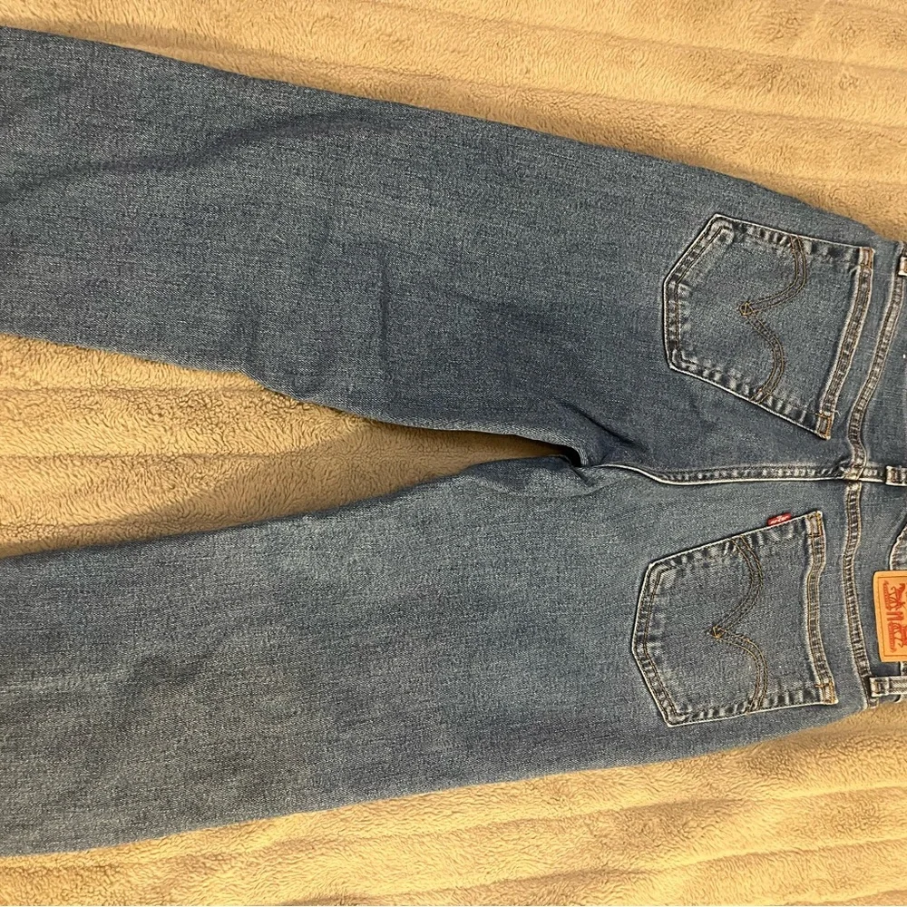 Levi's Blue Boot Cut Jeans with Vintage Appeal - Picture 2 of 4